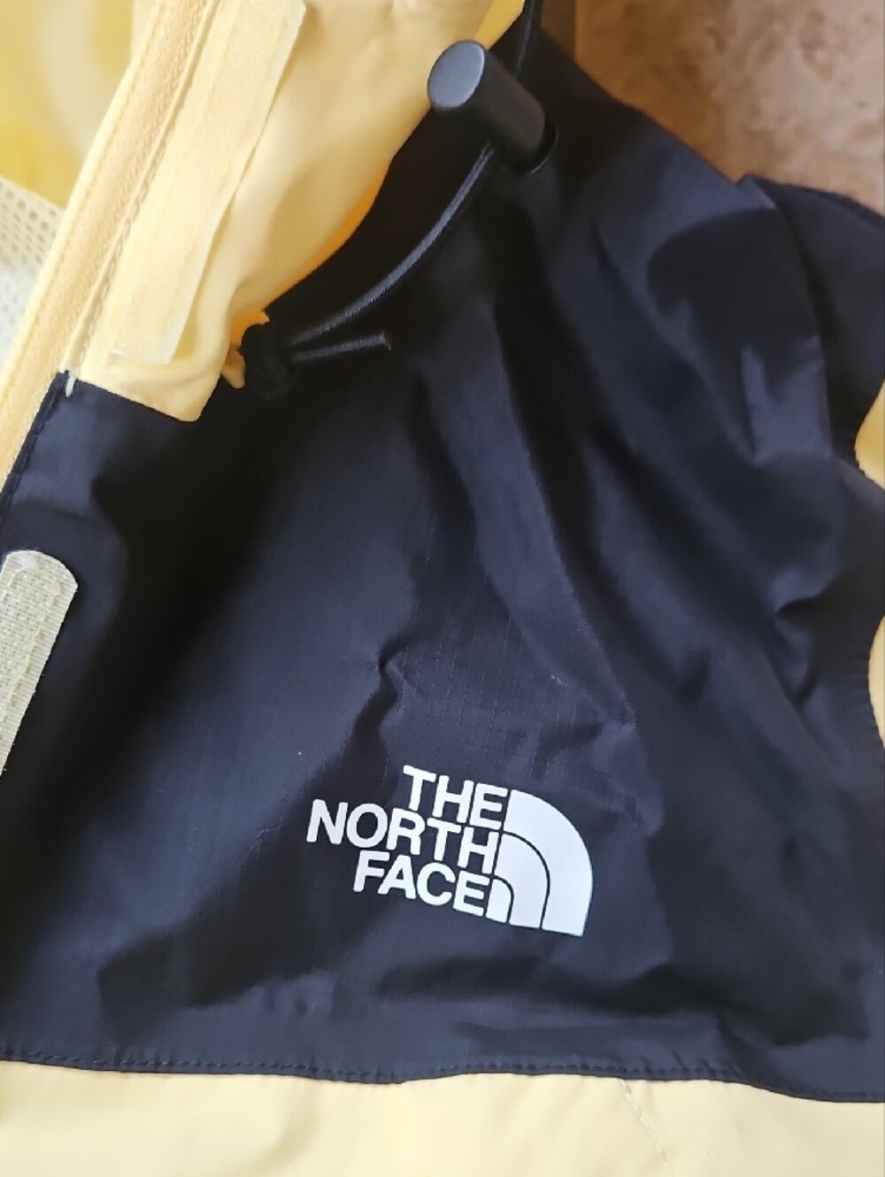 The North Face Yellow and Black Hooded Shell Jacket - Picture 3 of 11